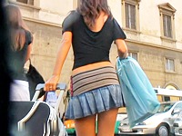 Tiny teen is carrying the huge suitcase which is too heavy for her slim body. Well, she has no forces to look around and gets the exciting up skirt shot